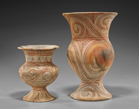 Two Ancient Thai Ban Chiang Vessels: Two Ancient Thai Ban Chiang Vessels Two ancient Thai, Ban Chiang pottery vessels; both in globular form with everted rims and footed bottoms with various red swirl designs (the larger repairs with som