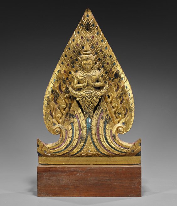 Southeast Asian Gilt Wood Buddha: Southeast Asian Gilt Wood Buddha Antique Southeast Asian, probably Thai, gilt and "jeweled" wood Buddha; the torso floating with hands in worship in front of a flaming mandorla (wear and some loss to 