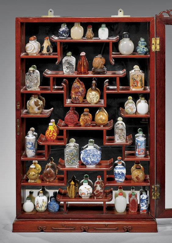 SNUFF BOTTLE COLLECTION IN DISPLAY CASE