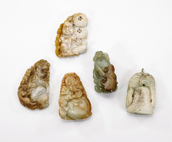 Five Chinese Carved Jadeites: Auspicious Pendants: Five Chinese Carved Jadeites: Auspicious Pendants Group of five Chinese carved auspicious jadeite pendants; a seated child with double coins; double gourd with ruyi scepter and chilong; oval form drag