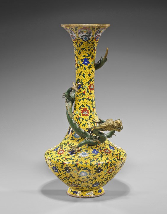 Old Chinese Cloisonné Dragon Vase: Old Chinese Cloisonné Dragon VaseOld Chinese cloisonné enamel vase; of elongated bottle footed form, yellow ground with scrolling floral detailing all over, bronze enameled dragon coiled around the
