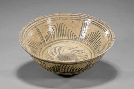 Antique Thai Sawankhalok Ceramic Bowl: Antique Thai Sawankhalok Ceramic Bowl Antique Thai Sawankhalok ceramic bowl; of simple circular form with tall flaring sides, decorated with somewhat palm-leaf design to interior and exterior (loss of