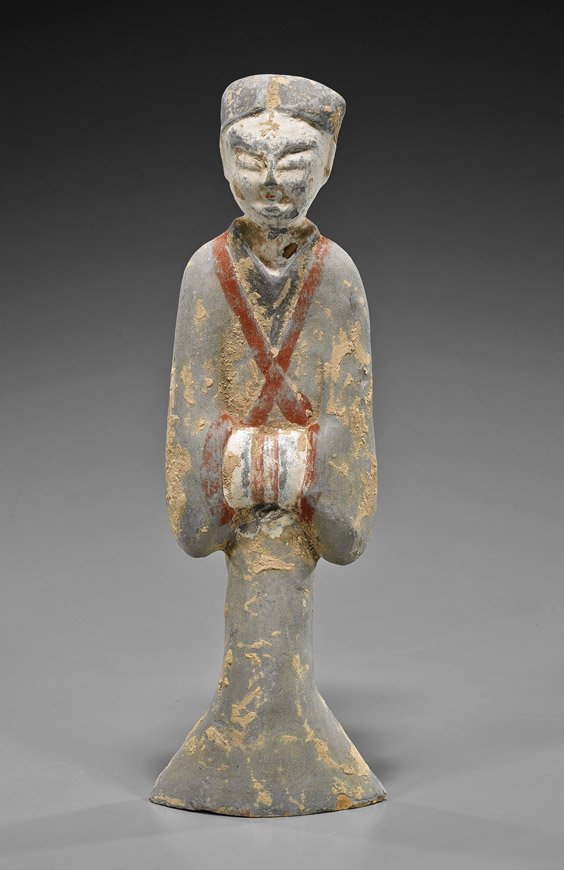 Han Dynasty Pottery Standing Female Figure: Han Dynasty Pottery Standing Female Figure Chinese Han Dynasty pottery figure; of a flattened standing female figure, her hands together low at her waist, with much remaining original pigments (usual 