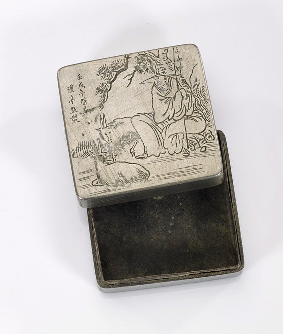 Antique Chinese White Brass Ink Box: Antique Chinese White Brass Ink Box Antique Chinese white brass ink box; of square form, depicting a seated farmer with two long horned goats at his side, inscription and seal mark (usual minor wear)l