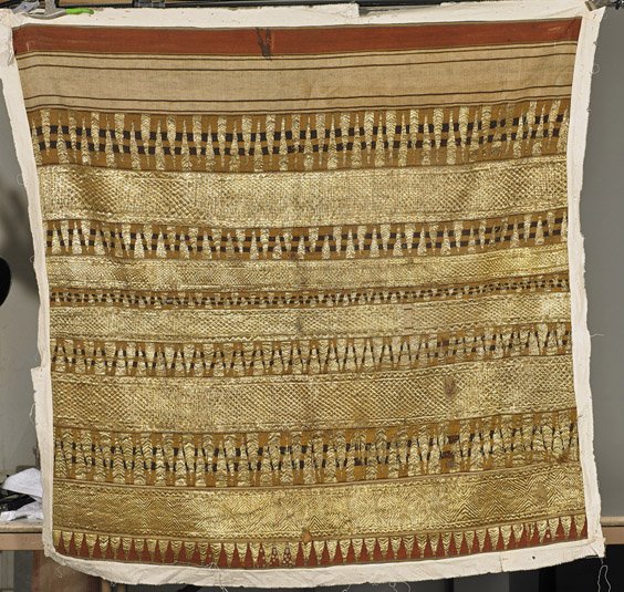 Indonesian Embroidered Ceremonial Linen Cloth: Indonesian Embroidered Ceremonial Linen Cloth Indonesian gilt thread embroidered ceremonial shoulder or skirt linen cloth (kain limar); of rectangular form with alternating bands of triangle designs (
