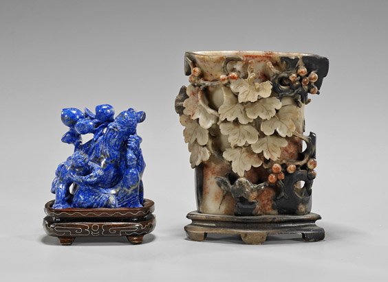 Two Chinese Carvings: Lapis & Soapstone: Two Chinese Carvings: Lapis & Soapstone Two Chinese carvings: lapis lazuli seated figure, possibly Shoulao with child and peaches; together with soapstone brushpot of oval form with openwork leaf deta
