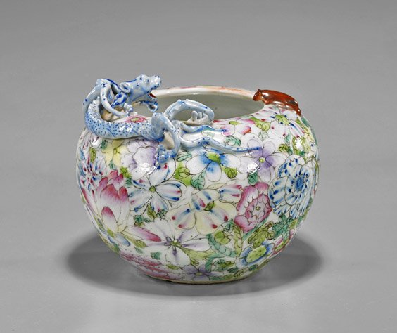 Chinese Mille Fleur Enameled Porcelain Jar: Chinese Mille Fleur Enameled Porcelain Jar Chinese mille fleur enameled porcelain jar; of circular form with small mouth, various flowers in muted shades of pinks, blues and purples, moulded hydra and