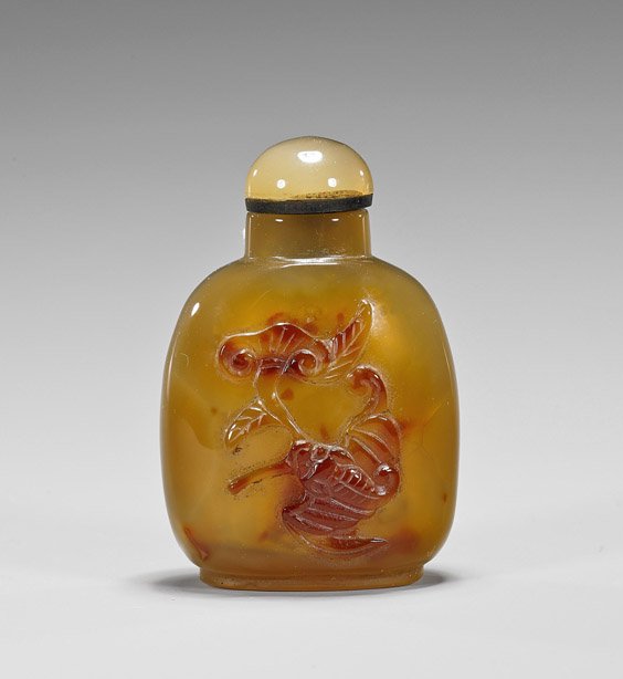 Carved Cameo Agate Snuff Bottle: Carved Cameo Agate Snuff Bottle Well hollowed carved cameo agate snuff bottle; of rounded square form with raised base, the front with an auspicious bat holding a lingzhi mushroom, agate stopper (no s