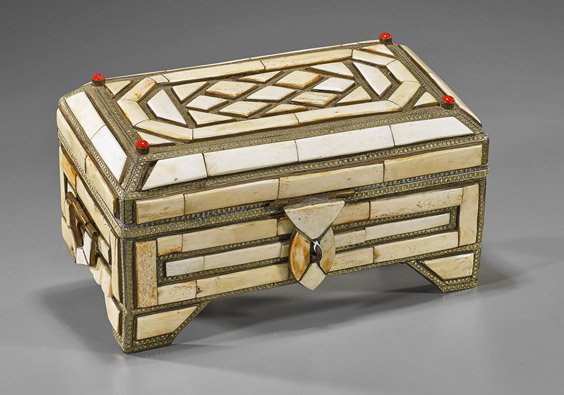 Antique Moroccan Bone Trinket Box: Antique Moroccan Bone Trinket Box Antique Moroccan bone appliqué and brass box; rectangular with mosaic design of bone, stamped brass trim: each corner set with a red glass jewel, velvet lined interi