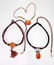 Three Carved Carnelian Pendants
