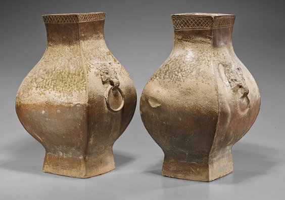 Pair Heavy Han Dynasty Ogre Mask Vases: Pair Heavy Han Dynasty Ogre Mask Vases Pair of heavy Han Dynasty glazed pottery vases; of squared form with bulbous body, ogre mask handles and faux rings to shoulder, incised hatch design to rim (chi