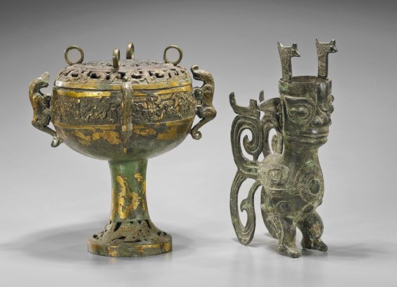 Two Archaistic Chinese Bronze Vessels: Two Archaistic Chinese Bronze Vessels Two archaistic Chinese bronze vessels used for presentation: a shallow bowl raised on a high central foot (dòu), four chilong attachments and an openwork cover; 