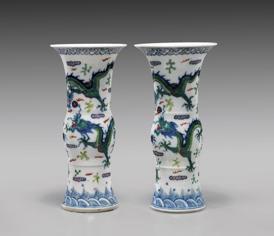 PAIR DRAGON PORCELAIN VASES: 綠彩龍紋小花觚 一對 PAIR DRAGON PORCELAIN VASES Pair of Chinese, enameled porcelain vases; each of beaker form, with design of writhing dragons am