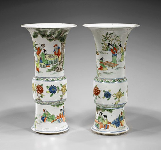 Pair Chinese Enameled Porcelain Beaker Vases: Pair Chinese Enameled Porcelain Beaker Vases Pair of tall Chinese enameled porcelain vases; of beaker form with bulbous body, each depicting a continuous figural scene of scholars and beauties relaxin