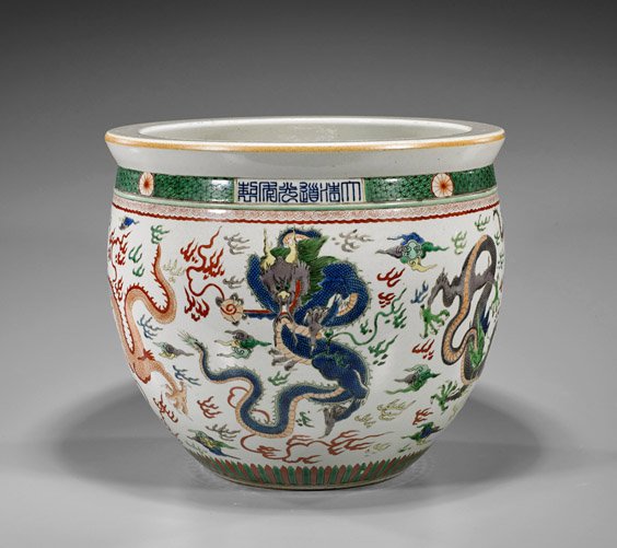 Small Chinese Famille Verte Jardinière: Small Chinese Famille Verte Jardinière Small Chinese Famille Verte enamel porcelain jardinière; of circular form with flared rim, continuous multi-colored dragons amid clouds, 6-character mark; D: 1