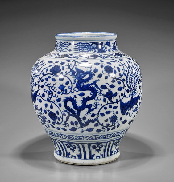 Ming-Style Blue & White Dragon Jar: Ming-Style Blue & White Dragon Jar Chinese Ming-style blue and white porcelain jar; of baluster form with flared foot, alternating dragon and phoenix amid blossoming flowers, 6-character mark; H: 16"