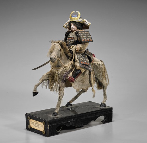 Antique Japanese Samurai Doll: Antique Japanese Samurai Doll Antique Japanese warrior doll; depicting a samurai from the Genroku era, in full armor sitting on a horse (typical wear and flaws); H: 11"; lacquer base