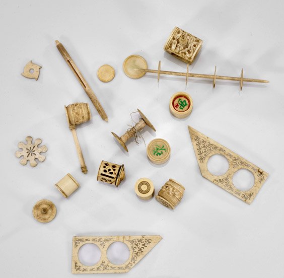 Seventeen Antique Chinese Bone Carvings: Seventeen Antique Chinese Bone Carvings Group of seventeen antique Chinese bone carvings: fifteen sewing implements with floral designs and one with mother of pearl inlay; together with two game piece