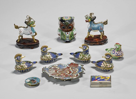 Eleven Small Chinese Cloisonné Enamels: Eleven Small Chinese Cloisonné Enamels Group of eleven small Chinese cloisonné enamels: two qilin standing four-square; sitting owl; two dishes, one foliate and the other circular; dragon pill box; 