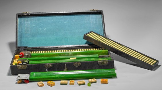 Old Chinese Mahjong Set: Old Chinese Mahjong Set Old Chinese celluloid mahjong set; celluloid tiles, dice, five tile holders with counting chips and extra tiles; set in travel case (not checked for completeness); L: 19 7/8"