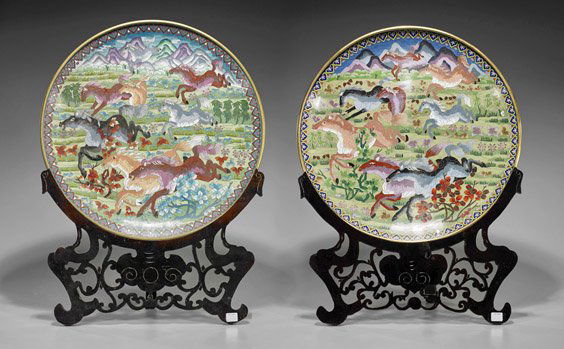 Pair Large Chinese Cloisonné Chargers: Pair Large Chinese Cloisonné ChargersPair of large Chinese cloisonné enamel chargers; of shallow circular form, each depicting eight wild horses galloping across lush open pastures with imposing mou