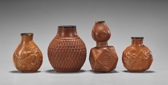 Four Moulded Gourd Snuff Bottles: Four Moulded Gourd Snuff Bottles Group of four unusual moulded gourd snuff bottles, including: large circular form with basket weave design, small circular form with Buddhist emblems to front and vers