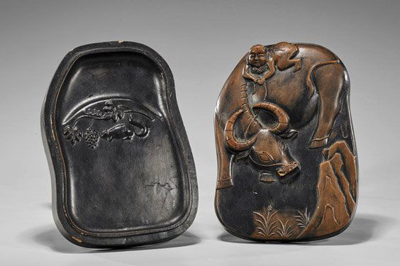 Chinese Ceramic & Lacquer Inkstone: Chinese Ceramic & Lacquer InkstoneChinese ceramic and lacquer inkstone with cover: the inkstone of unique form with moulded squirrel under grapes below well; the cover depicting a child riding a water