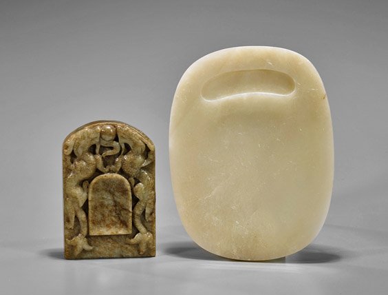 Two Chinese Carved Jade Inkstones: Two Chinese Carved Jade Inkstones Two Chinese carved jade inkstones: simple oval form with water well at top; together with rectangular form with contesting dragons in high relief; D: 7 1/2" (larger)