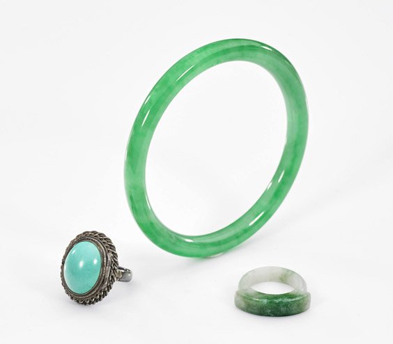Three Jewelry Pieces: Jadeite & Turquoise: Three Jewelry Pieces: Jadeite & Turquoise Two Chinese carved jadeites -- bangle bracelet of apple green coloration, saddle ring with "moss-in-snow" coloration; together with sterling silver locket rin