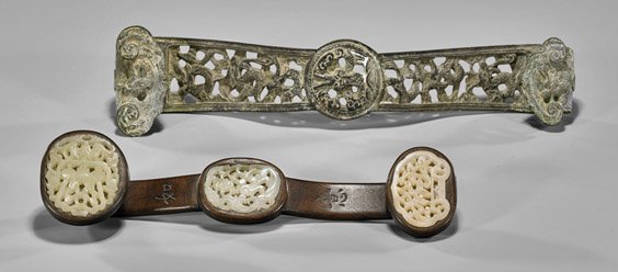 Two Chinese Ruyi Scepters: Bronze & Wood: Two Chinese Ruyi Scepters: Bronze & Wood Two Chinese ruyi scepters: antique bronze with writhing dragon openwork and medallion at center; together with wood inlaid with three hardstone plaques of scro