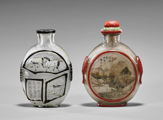 Two Inside Painted Glass Snuff Bottles: Two Inside Painted Glass Snuff Bottles Two inside painted glass snuff bottles: red overlay with ogre mask handles, landscape scenes to each side, composite stopper; together with black overlay with Sh