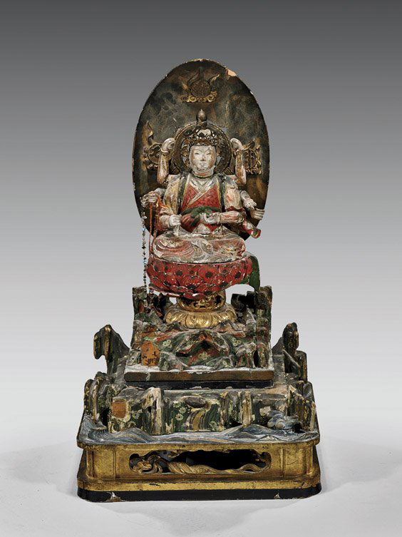 Large Antique Carved Wood Kannon: Large Antique Carved Wood KannonLarge and very elaborate, antique Japanese carved and lacquered wood shrine figure; of a multi-armed Kannon, seated on lotus pedestal, upon a raised, two-tier base; wit