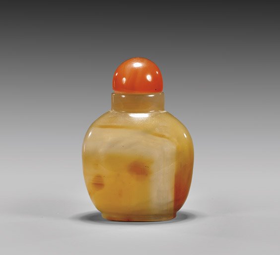 FINE AGATE SNUFF AGATE BOTTLE: FINE AGATE SNUFF AGATE BOTTLE Very finely hollowed, Chinese agate snuff bottle; of bulbous, slightly tapered form, and of highly translucent whitish-tan coloration; matching carnelian agate stopper; H