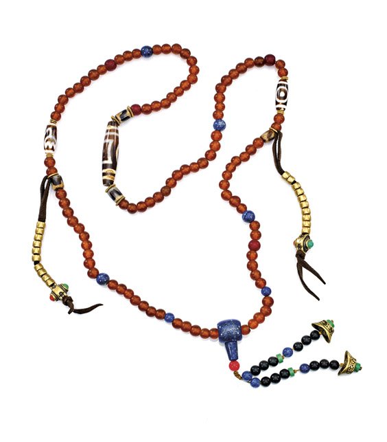 GLASS, DZI AND LAPIS PRAYER BEAD NECKLACE: GLASS, DZI AND LAPIS PRAYER BEAD NECKLACE Buddhist prayer bead necklace; comprised of cognac color glass round beads, interspersed lapis lazuli beads and endcap, with a large and two smaller dzi agate