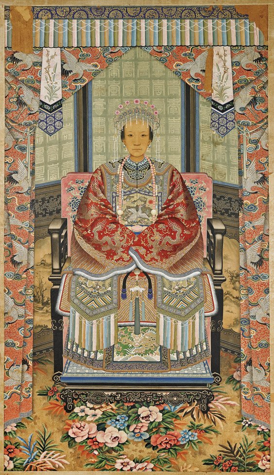 ANTIQUE CHINESE ANCESTRAL PORTRAIT: ANTIQUE CHINESE ANCESTRAL PORTRAIT Antique Chinese ink and color on paper ancestral portrait; depicting a lady in formal court dress: of an elaborate red dragon robe with mandarin square; ornate beade