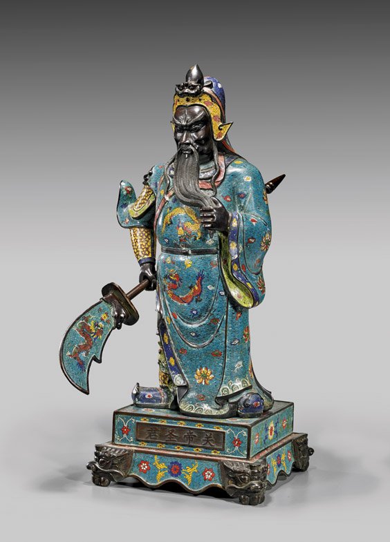 LARGE CHINESE CLOISONNÉ GUANDI: LARGE CHINESE CLOISONNÉ GUANDI Large Chinese cloisonne enamel figure; of Guandi standing in ornate robes and holding his beard in contemplation, brandishing a separate guandao weapon; an on a separat