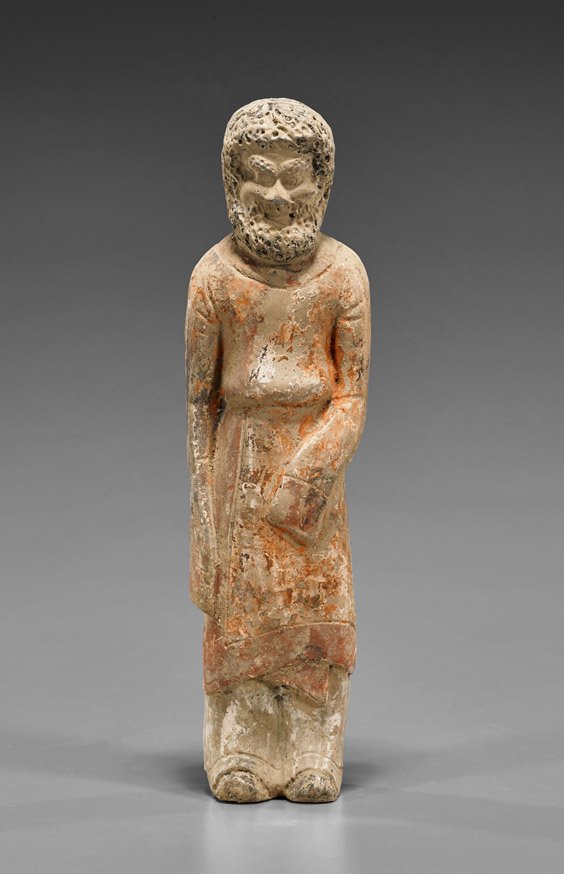 Han Dynasty Pottery Foreigner: Han Dynasty Pottery Foreigner Chinese Han Dynasty glazed pottery figure; of a standing bearded foreigner, some original pigment (typical wear and flaws); H: 9 3/4"