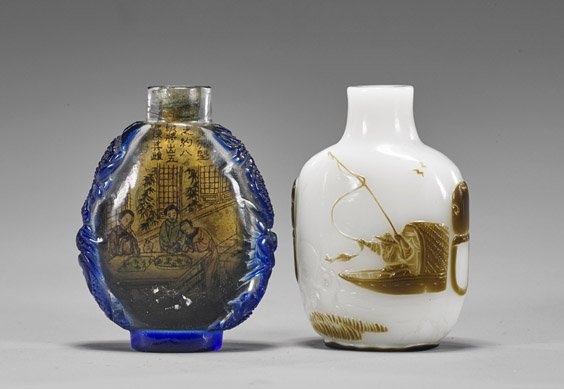Two Carved Overlay Glass Snuff Bottles: Two Carved Overlay Glass Snuff Bottles Two carved overlay glass snuff bottles: rectangular form of milky white ground with incised mountains, brown fisherman to front and farmer to verso, mask and fau