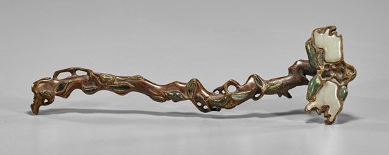 Chinese Hardstone Set Bronze Ruyi Scepter: Chinese Hardstone Set Bronze Ruyi Scepter Chinese bronze ruyi scepter; resembling the natural form with celadon and spinach green hardstone accents (some stones missing); L: 11"