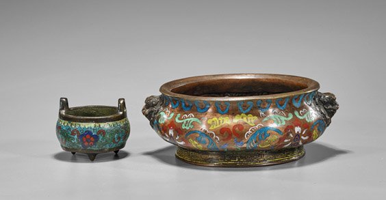 Two Chinese Enameled Bronze Censers: Two Chinese Enameled Bronze CensersTwo Chinese enameled bronze censers: Ming-style champlevé squat bulbous body with lion handles and scrolling florals, moulded interior; together with small cloisonn