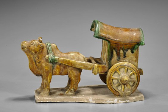 Group of 11 Chinese & Japanese Items: Group of 11 Chinese & Japanese Items Group of eleven Chinese and Japanese items, including: six sancai glazed ceramics -- ox yoked to a cart, pair of jesters, pair of Fo lions, Tang-style oval form br