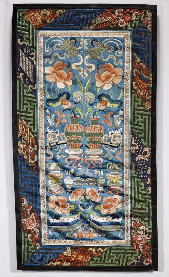 Pair Chinese Embroidered Silk Sleeve Bands: Pair Chinese Embroidered Silk Sleeve Bands Pair of Chinese embroidered silk sleeve bands: one with Buddhist emblems, the other with auspicious vases; each on blue ground (typical wear and flaws); 24" 