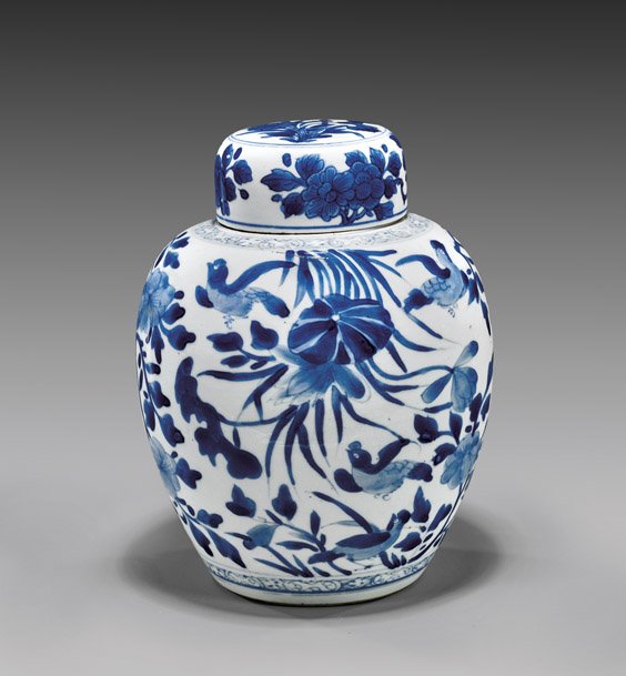 KANGXI PERIOD BLUE & WHITE GINGER JAR: KANGXI PERIOD BLUE & WHITE GINGER JARChinese Kangxi Period blue and white porcelain ginger jar; the finely potted form with design of various birds amid lotus and plum blossoms; matching rounded cover
