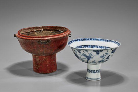 MING DYNASTY BLUE & WHITE STEM CUP: MING DYNASTY BLUE & WHITE STEM CUP 15th Century, Chinese early Ming Dynasty blue and white porcelain stem cup; of wide flared form set on a tall pedestal foot; the interior with bands of Tibetan calli