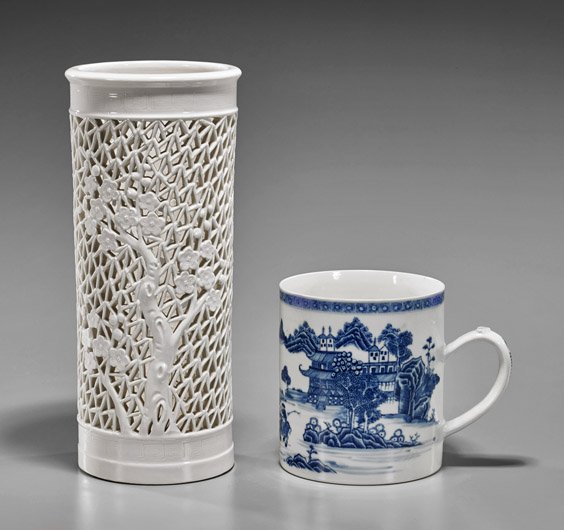 Two Chinese Porcelains: Cup & Hat Stand: Two Chinese Porcelains: Cup & Hat Stand Two Chinese porcelains: large blue and white cylindrical cup with handle depicting a continuous landscape scene; together with blanc de chine hat stand with ope