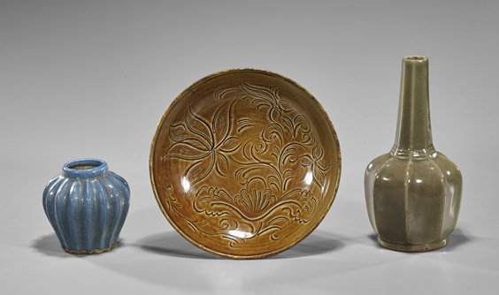 Three Various Chinese Glazed Porcelains: Three Various Chinese Glazed Porcelains Group of three Chinese porcelains: brown glazed plate with incised floral details; celadon crackle glazed faceted bottle vase; together with blue flambé glazed
