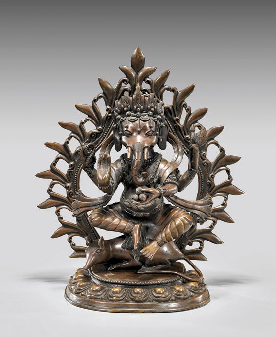 Tibetan or Nepalese Copper Ganesha: Tibetan or Nepalese Copper Ganesha Tibetan or Nepalese copper figure; of Ganesha, seated upon a large rat, holding emblems in three of his hands, wearing an ornate headdress accented with "jewels"; wi