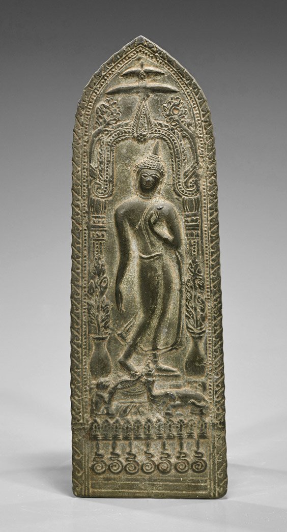 Southeast Asian Bronze Buddhist Panel: Southeast Asian Bronze Buddhist Panel Southeast Asian bronze panel; of rectangular form with pointed top, a standing Buddhist deity wearing a sheer skirt flanked by potted plants and underneath a flam
