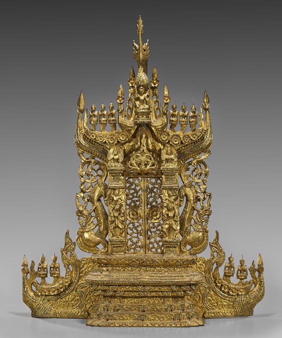 Old Thai Gilt & Carved Wood Buddhist Shrine: Old Thai Gilt & Carved Wood Buddhist Shrine Old Thai gilt and carved wood Buddhist shrine; multi-stepped pedestal base with an architectural façade, movable lotus doors flanked by tall columns and si