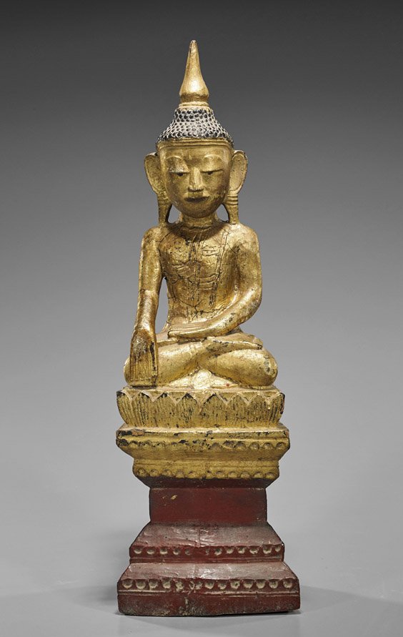 Antique Southeast Asian Gilt Wood Buddha: Antique Southeast Asian Gilt Wood Buddha Antique Southeast Asian, probably Burmese, gilt and carved wood Buddha; seated in lotus position atop lotus base with double pedestal, hands in "Earth Witness"